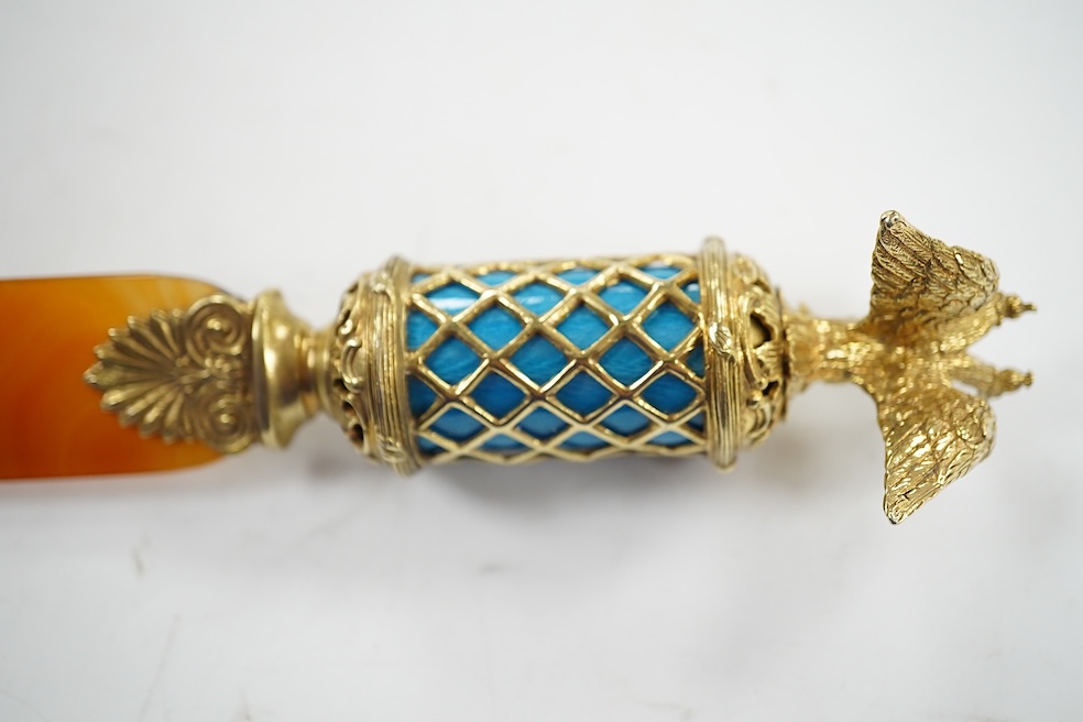 A continental gilt white metal and enamel mounted agate paper knife, 22.5cm. Condition - good